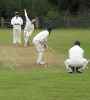 Sam bowls at Broadclyst, 2011